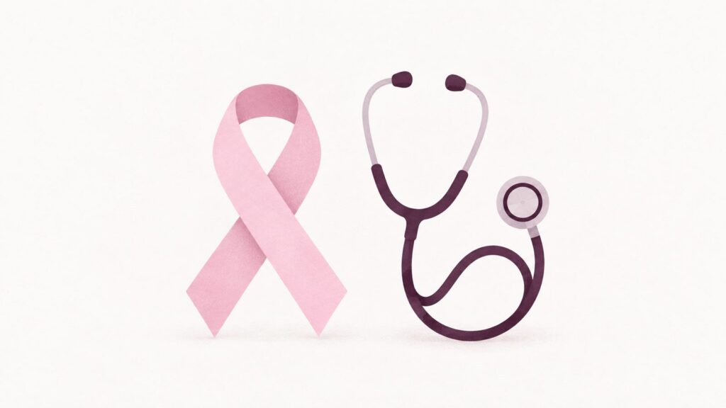 Laço rosa ao lado de um estetoscópio